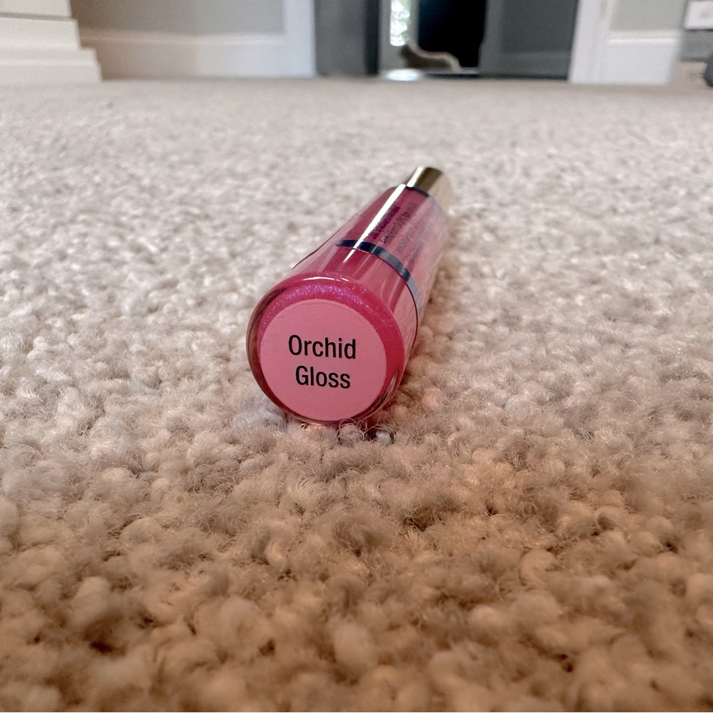 LipSense by SeneGence Moisturizing Gloss. .25 fl. oz./7.5 mL. Orchid Gloss - Picture 2 of 2